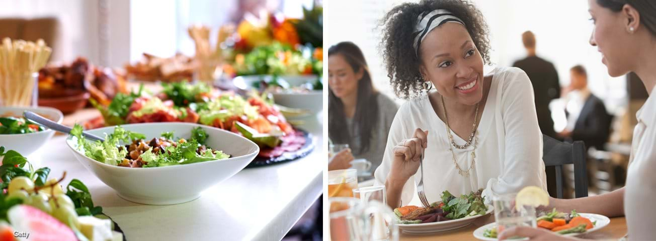 Food on dinner table and two women having lunch